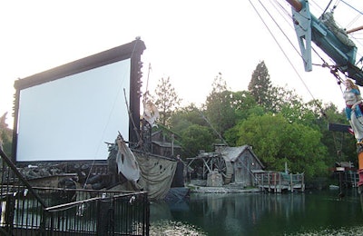 The movie made its debut on a giant screen over the water, with a pirate ship docked nearby.