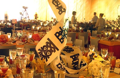 A table ribbon was printed with the artistic interpretation of the word kicked, one of the signs of domestic violence.