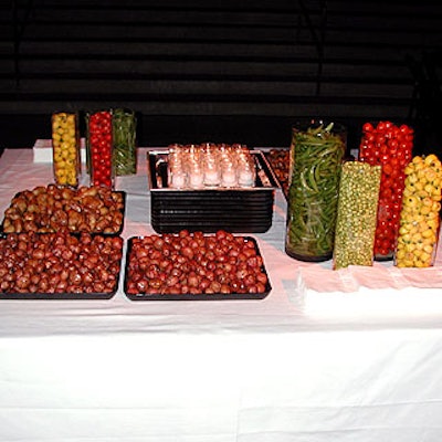 David Turk of Indiana Market and Catering took the event's 'Less Is More' theme and created a food display with trays of roasted potatoes and vases of beans, zucchini and cherrystone tomatoes.