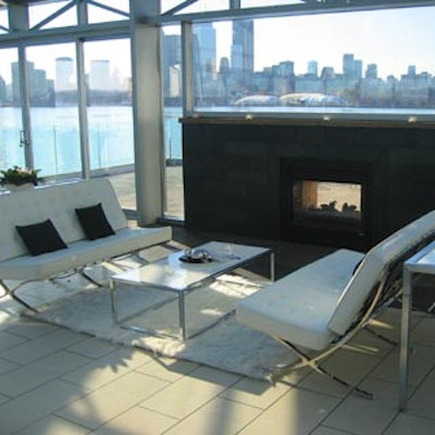 Furnishings by Corey provided white lounge furniture.