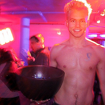 Shirtless caterwaiters from Dan Taylor carried bowls of Smint mints around the room and posed for photos with guests.