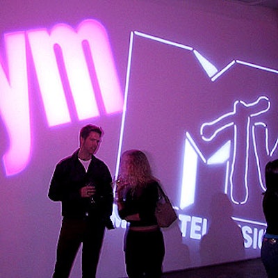 Colorful projections of the YM and MTV logos by Scharff Weisberg covered the walls at Milk Studios.