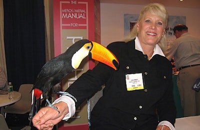 There's nothing like a live animal to draw a crowd, especially one thatlooks slightly fake. Perennial wildlife lady Joan Embery chatted withattendees (along with a live toucan friend) at Merck's booth, promotingThe Merck/Merial Manual for Pet Health Home Edition.