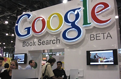 Staking out some premium real estate in the center of the main floor, Google promoted its Book Search BETA. The buzz of the day on Friday: Google’s party.