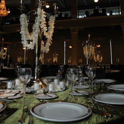 Kiwi coloured linens and floral accents on candelabra centerpieces decorated the dinner tables.