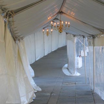 Regal Tent Productions provided a tented passageway lit by gold coloured chandeliers.