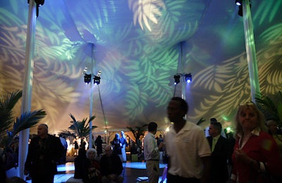 The ceiling of the main tent over the dance floor was splashed with leaf projections.