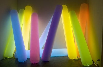 Like a sculpture of giant popsicles, clusters of inflatable lights stood at each end of the venue's hallway.