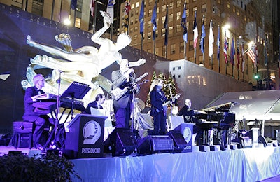 The Peter Duchin Orchestra performed on a stage directly under Paul Manship's famous statue of Prometheus.