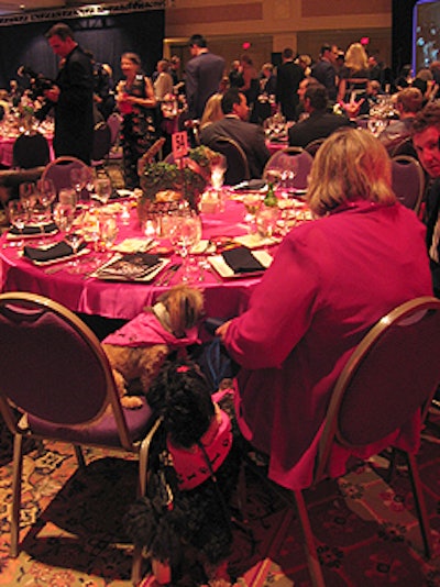 Dogs sat alongside their owners during the presentations anddinner.