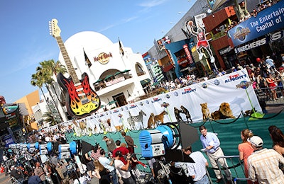 Before the premiere, guests passed in front of a colorful press wall decked with imagery from the movie.