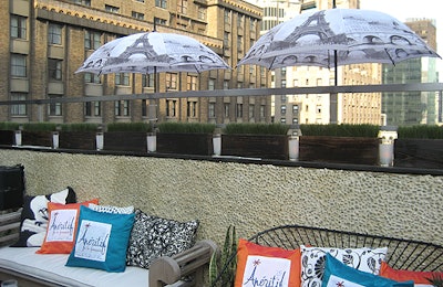 Umbrellas printed with an Eiffel Tower scene added a dreamlike quality to the deck.