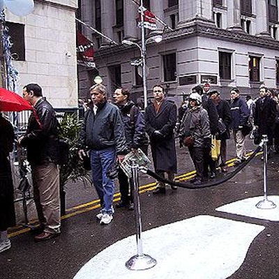 People passing the exchange lined up for free bagels and coffee from Lackmann Culinary Services.