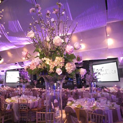 Floral-themed lighting, rich linens, billowy wall and ceiling drapes, and floral displays created an opulent look for the 2007 Magnolia Ball.