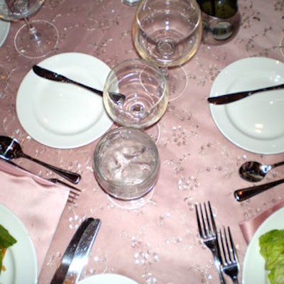 Sequin champagne overlays from Table Wraps adorned the 'Royal Sponsor' tables.