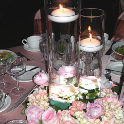 Floating candles provided additional ambience in this floral display.
