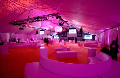 Following the presentation, the viewing tent was converted into a lounge area with orange carpeting and custom paisleylike light patterns on the ceiling.