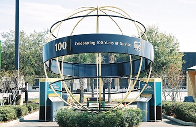 A custom-made 14-foot globe stands at the entrance to the UPS Centennial Tour.