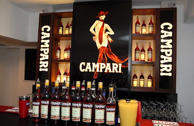 A large Campari poster decorating the bar adjacent to the exhibition rooms contended with the artwork on the walls for guests' attention.