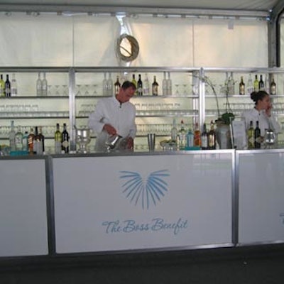 A long white bar dominated the silent auction tent.