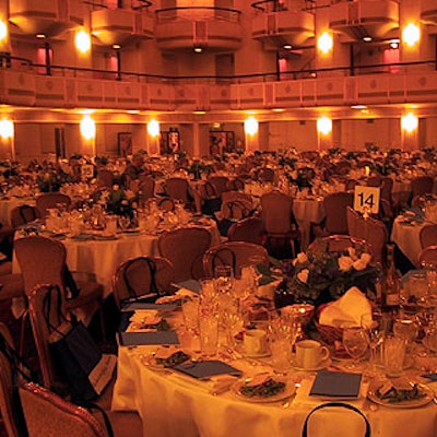 The interior of the Grand Ballroom of the Waldorf=Astoria was lit with soft light for the event.