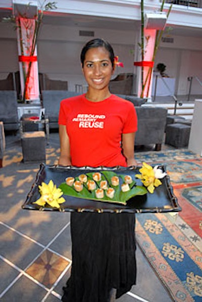 Servers wearing shirts made from organic certified cotton offered guests organic hors d'oeuvres such as vegetable and tofu summer rolls, created by Tres L.A.