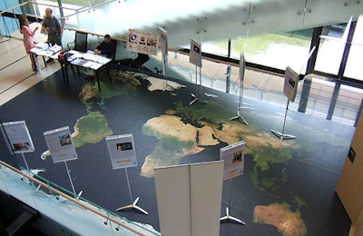 Guests roamed from table to table in the venue's Earth-centric hallway during breaks from the panels and discussions. At each table, attendees could learn more about developing technologies that are focused on turning water into energy and replenishing the world's depleting water sources.