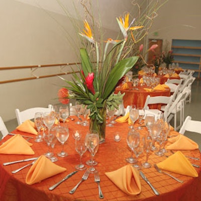 Centerpiecesfeaturing birds-of-paradise adorned the tables.