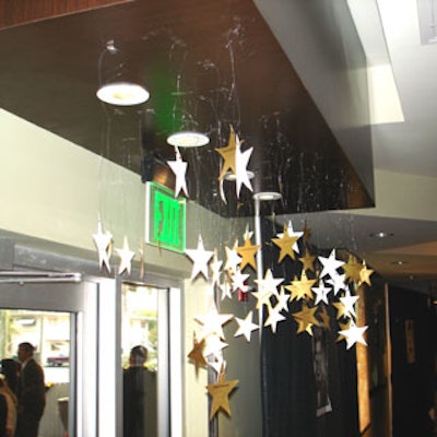 Arrivingguests pulled down their star-shaped place cards, which were hung from theentrance.