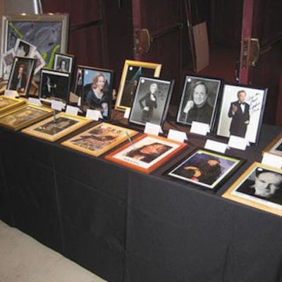 Framed and signed photographs of manycelebrities were on the bidding block.