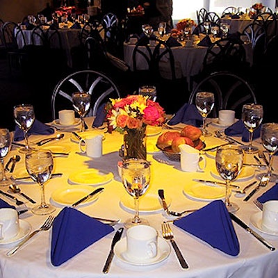 The conference lunch was served in the Millennium Broadway Hotel's eighth floor banquet area. The small floral centerpieces were by StoneKelly.
