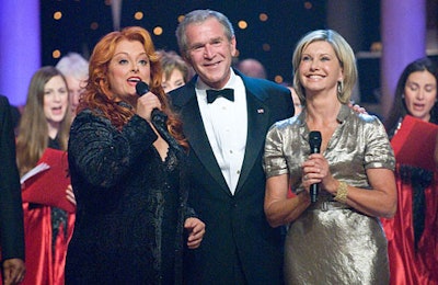 Performers Wynonna Judd and Olivia Newton-John serenaded President Bush.