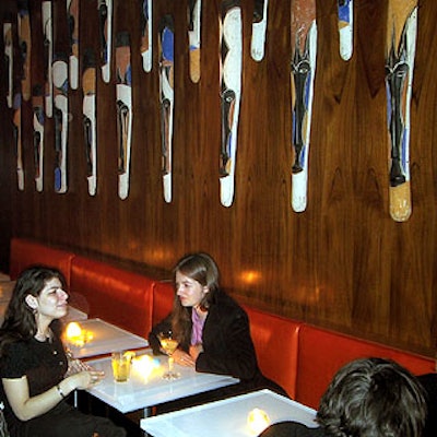 The dining area of Sugar is decorated with African fertility masks.