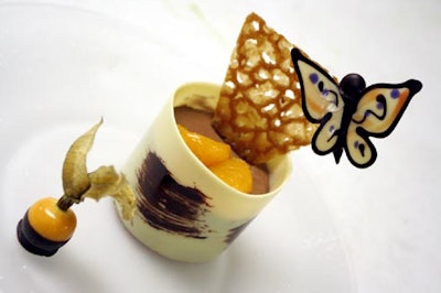 The Windsor Arms served a dark chocolate mousse topped with spicy mandarin orange compote, a brandy basket wafer, and an edible butterfly.