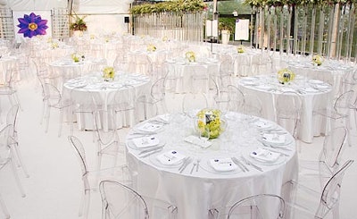 Telus’ purple flower logo and green florals in oval, clear glass centerpieces provided colour in the dining space.