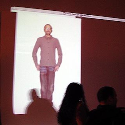 During the cocktail party, images taken in the adjacent photo studio were projected onto the curved cyclorama wall.