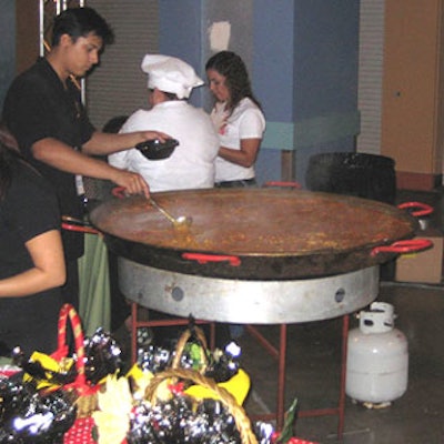 Simmering together varying combinations of rice, vegetables, meat, chicken, and seafood on the spot, Paellas R Us provided some of the night's freshest food.