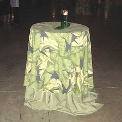 Over the Top supplied leafy-design table linens that matched the rest of the decor and helped build up the tropical atmosphere.