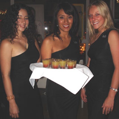Three spokeswomen for Tezón Tequila passed out shots to partygoers at the hotel.