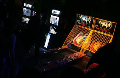 Adults and kids tested out Wii's new Harry Potter game, and also played more traditional games like skee-ball.