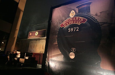 Guests found a re-creation of the Hogwart's Express 9¾ platform and a projection of its train at the end of a pathway in the outdoor area.