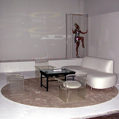Keith Largent of Largent Studios rented 70's mod white couches from Art & Industrial Design Studio.