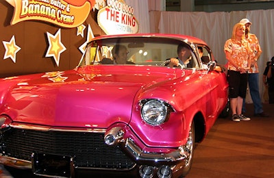 Members of Elvis's inner circle sit inside the Elvis Tribute Car.