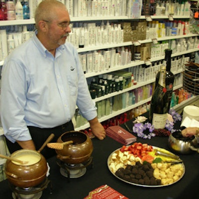 The Melting Pot catered the event by serving chocolate fondue and more treats that delighted attendees.