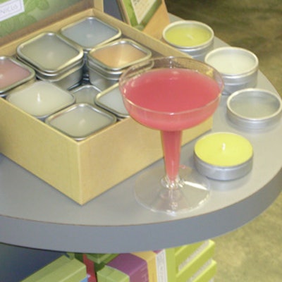 The event's signature cocktail, the 'Spraytini,' was served in see-through plastic martini glasses and drunk throughout the store.