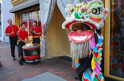 A lion dancer and musicians greeted guests at the restaurant's entrance.
