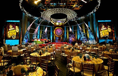 Guests watched the taping from cocktail tables covered in gold linens.