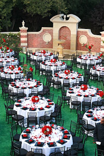 Round dinner tables sat atop the home's carpeted lawn.