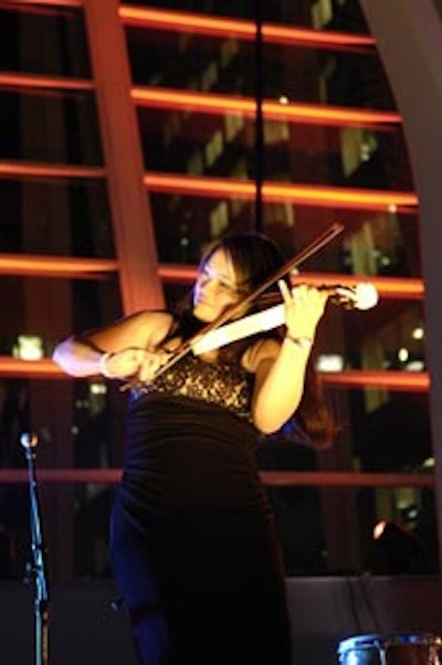 Violinist Sonia Lee performed on one of several performance stages erected for the event.