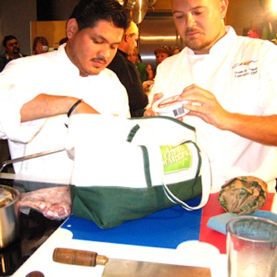 The Chispa team examined ingredients contained in the 'secret bag.' Each team had five minutes to strategize over recipes and 45 minutes to create four dishes.